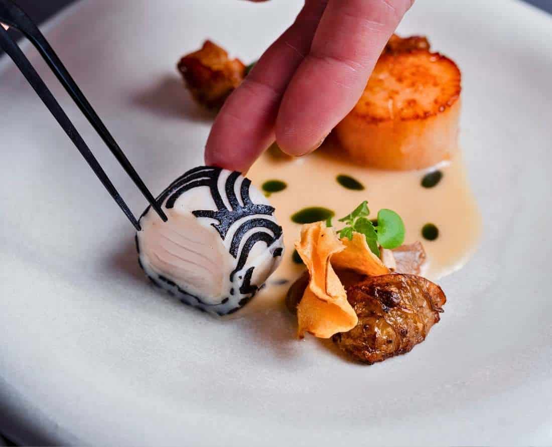 Sablefish and Scallop culinary delight prepared by award-winning Chef Alex Kim