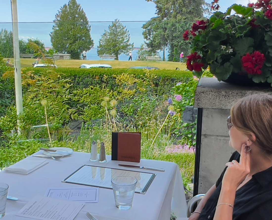Helen enjoys the views of English Bay from the patio and The Teahouse in Stanley Park one of the best summer patios in Vancouver
